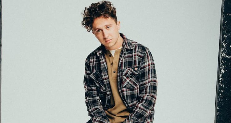 Joel Baker Teases Debut LP With "What's A Song" Video